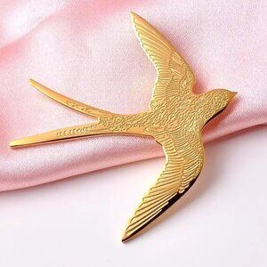 GOLDEN SWALLOW BROOCH
